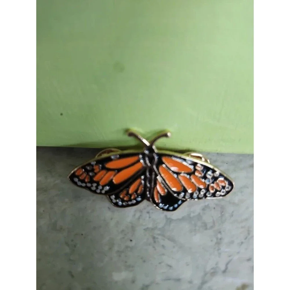 enamel over metal monarch butterfly brooch pin